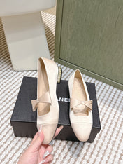 CHANEL 25S MARY JANE BALLET FLATS IN BEIGE SILK WITH BOW