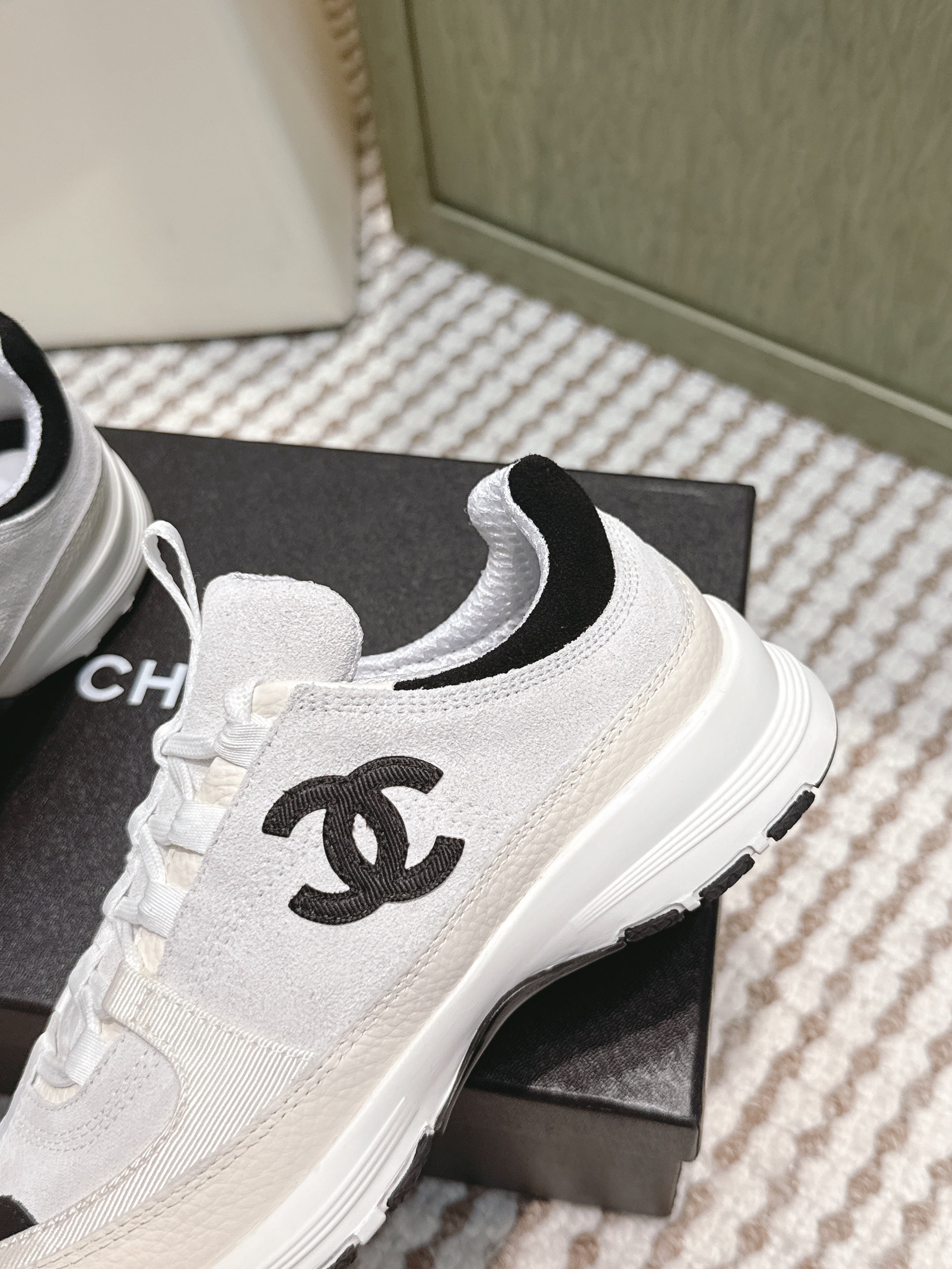 CHANEL 25S LUXURY SNEAKERS IN WHITE CALFSKIN AND SUEDE