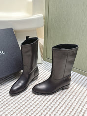 CHANEL 25S MID-CALF BOOTS IN BLACK CALFSKIN
