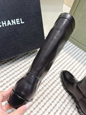 CHANEL 25S MID-CALF BOOTS IN BLACK CALFSKIN