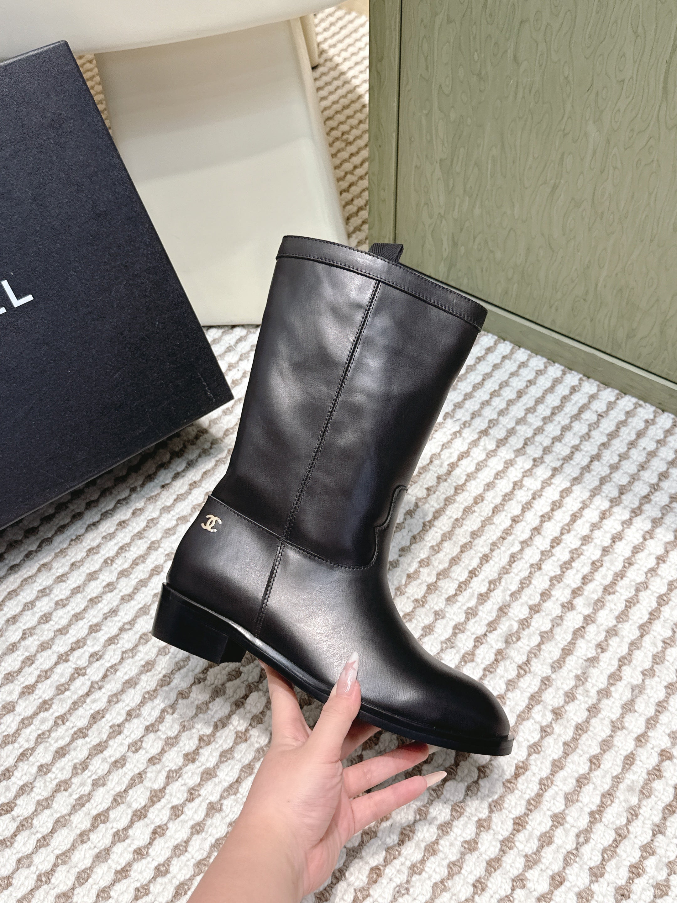 CHANEL 25S MID-CALF BOOTS IN BLACK CALFSKIN