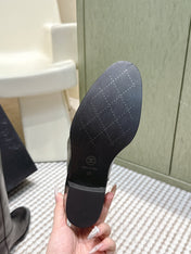 CHANEL 25S KNEE-HIGH BOOTS IN BLACK CALFSKIN