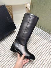 CHANEL 25S KNEE-HIGH BOOTS IN BLACK CALFSKIN