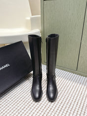 CHANEL 25S MID-CALF BOOTS IN BLACK CALFSKIN WITH ROUND TOE AND ZIPPER