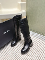 CHANEL 25S HIGH-CALF COWBOY BOOTS IN BLACK CALFSKIN DIAMOND-QUILTED