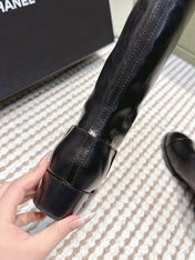 CHANEL 25S HIGH-CALF COWBOY BOOTS IN BLACK CALFSKIN DIAMOND-QUILTED