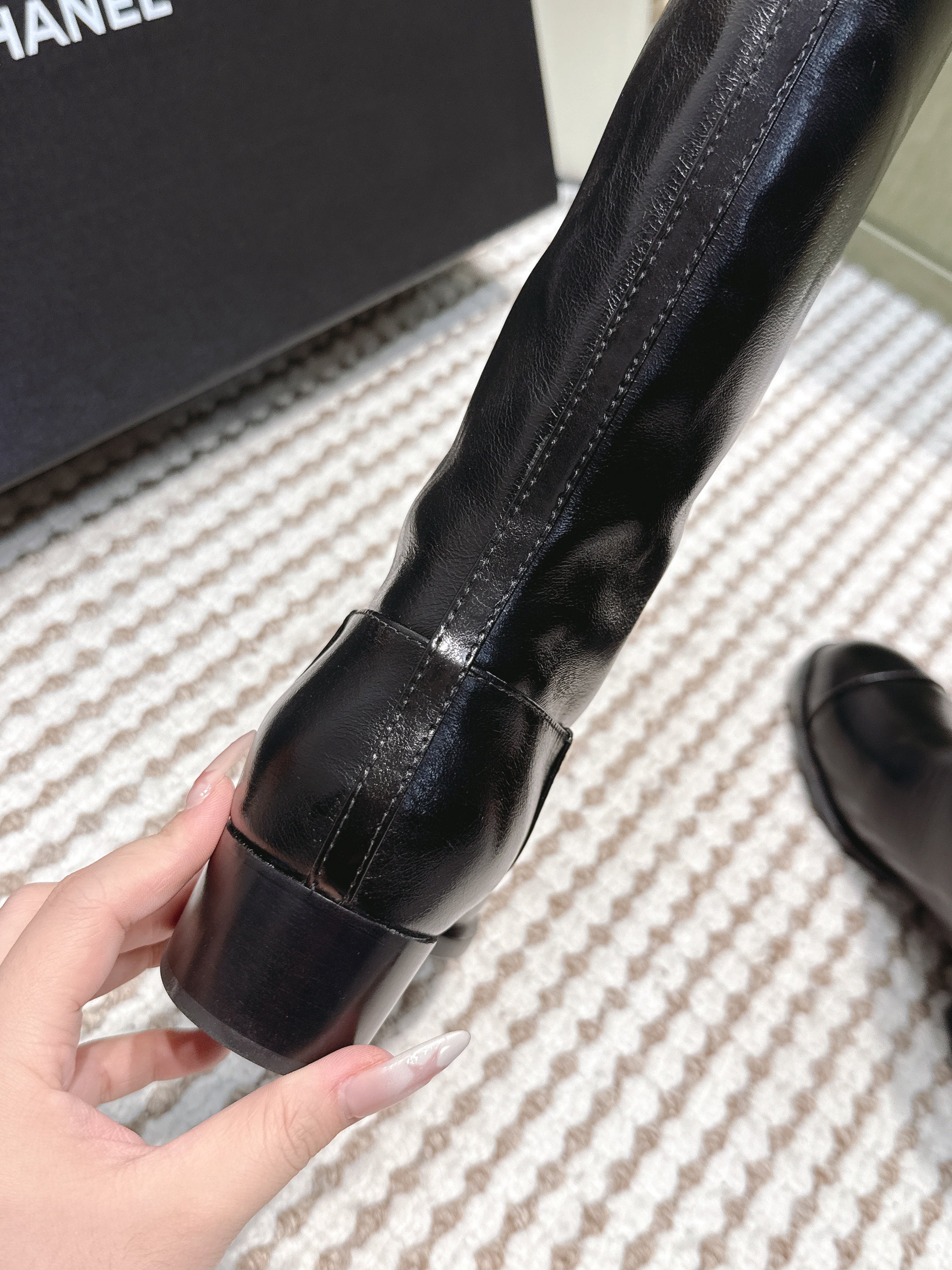 CHANEL 25S HIGH-CALF COWBOY BOOTS IN BLACK CALFSKIN DIAMOND-QUILTED