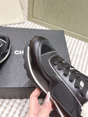 CHANEL 25S SNEAKERS IN BLACK SYNTHETIC FABRIC AND SUEDE CALFSKIN