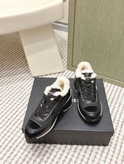CHANEL 25S SNEAKERS IN BLACK SYNTHETIC FABRIC AND SUEDE CALFSKIN
