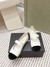 CHANEL 25S MARY JANE FLAT IN WHITE LAMBSKIN WITH BLACK VELVET CAP TOE