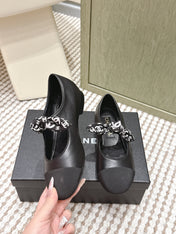 CHANEL 25S MARY JANES IN BLACK SHEARLING AND GROS GRAIN