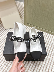 CHANEL 25S MARY JANES IN WHITE AND BLACK SHEARLING AND GROS GRAIN