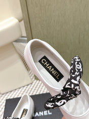 CHANEL 25S MARY JANES IN WHITE AND BLACK SHEARLING AND GROS GRAIN