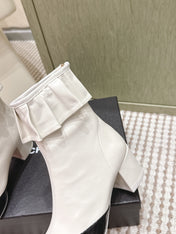 CHANEL 25S ANKLE BOOTS IN  WHITE CALFSKIN AND BLACK GLOSSY TOE RUCHED