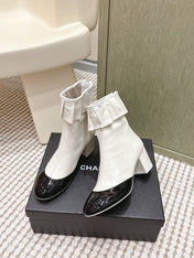 CHANEL 25S ANKLE BOOTS IN  WHITE CALFSKIN AND BLACK GLOSSY TOE RUCHED