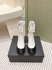 CHANEL 25S ANKLE BOOTS IN  WHITE CALFSKIN AND BLACK GLOSSY TOE RUCHED