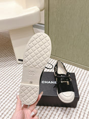 CHANEL 25S MOCCASINS IN BLACK AND LIGHT GREY SUEDE