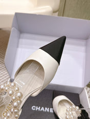 CHANEL 25S ESPADRILLE FLATS IN WHITE AND BLACK CALFSKIN WITH PEARL STRAP