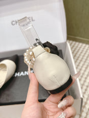 CHANEL 25S ESPADRILLE FLATS IN WHITE AND BLACK CALFSKIN WITH PEARL STRAP