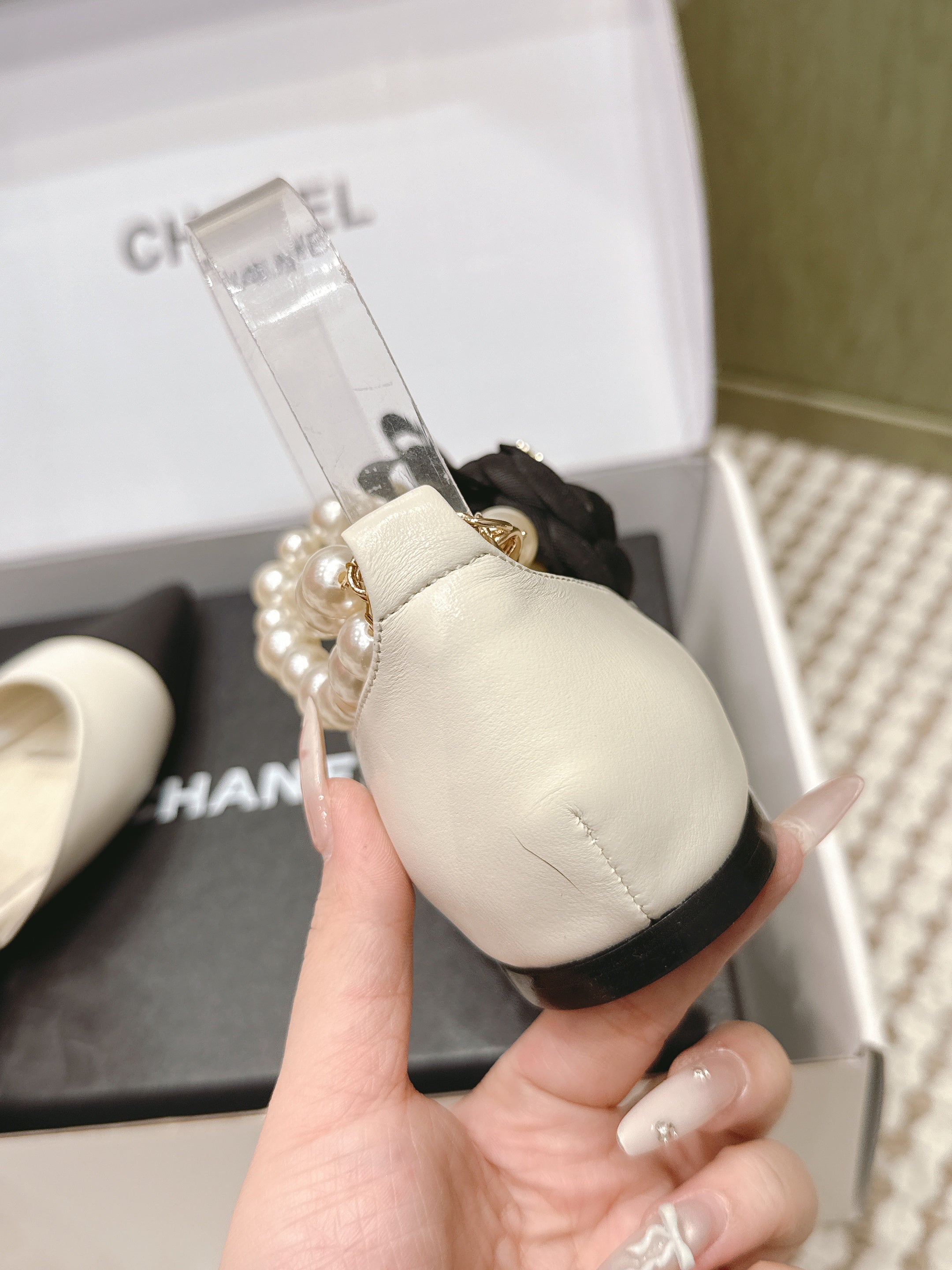 CHANEL 25S ESPADRILLE FLATS IN WHITE AND BLACK CALFSKIN WITH PEARL STRAP