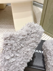 CHANEL 25S CLASSIC FURRY SLIDES IN GRAY WITH DOUBLE C LOGO