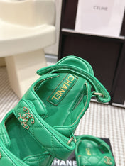 CHANEL 26S QUILTED DAD SANDALS IN GREEN CALFSKIN