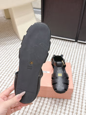 MIUMIU 26S RUCHES FISHERMAN SANDALS IN BLACK CALFSKIN GOLD HARDWARE