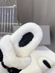 BALENCIAGA 25S SLIPPERS IN BLACK SUEDE AND WHITE WOOL