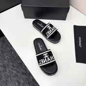 CC SLIDE SANDALS 25S IN BLACK FABRIC AND CALFSKIN