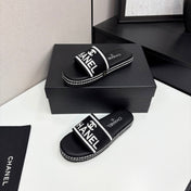 CC SLIDE SANDALS 25S IN BLACK FABRIC AND CALFSKIN