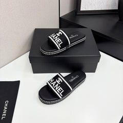 CC SLIDE SANDALS 25S IN BLACK FABRIC AND CALFSKIN