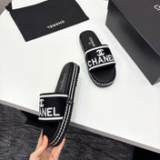 CC SLIDE SANDALS 25S IN BLACK FABRIC AND CALFSKIN