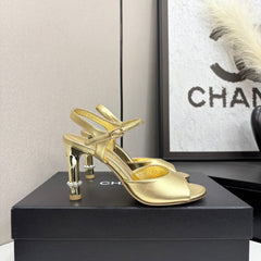 CC HIGH SANDAL 25S 80 MM IN GOLD CALFSKIN WITH PEARL DETAILS