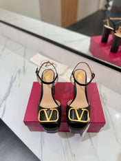 VLTN HIGH SANDAL 25S 115 MM IN BLACK LAMBSKIN WITH GOLD HARDWARE