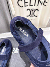 PRADA 25S COLLAPSE RE NYLON AND SUEDE BALLERINAS IN DARK BLUE