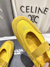 PRADA 25S COLLAPSE RE NYLON AND SUEDE BALLERINAS IN LEMON YELLOW