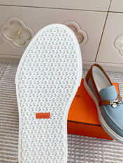 HM 25S SLIP-ON IN SKY BLUE CANVAS AND BROWN LAMBSKIN WITH SILVER HARDWARE