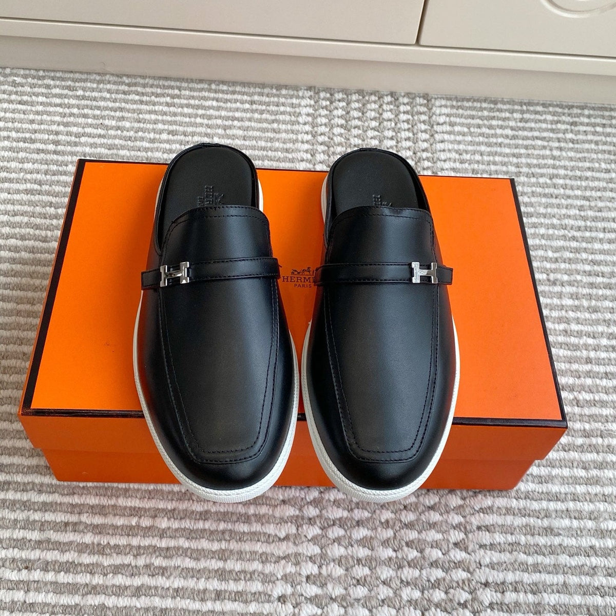 HM 25S MULES IN BLACK LAMBSKIN WITH SILVER HARDWARE