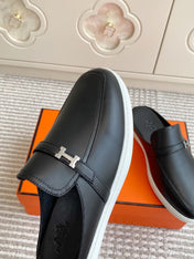 HM 25S MULES IN BLACK LAMBSKIN WITH SILVER HARDWARE