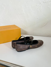ROMY FLAT BALLERINA IN BROWN MONOGRAM CALFSKIN