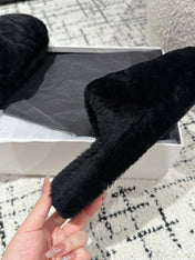 SLIPPER IN BLACK SHEARLING