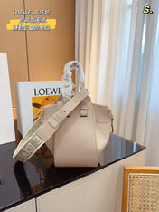 LOE 23 COMPACT HAMMOCK BAG IN SAND SATIN CALFSKIN