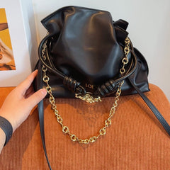 LOE 29 FLAMENCO CLUTCH IN BLACK NAPPA CALFSKIN