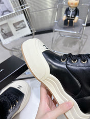 MARTIN BOOTS IN BLACK CALFSKIN AND LAMB FUR LINING