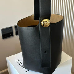 LOE MEDIUM 25 PEBBLE BUCKET IN BLACK MELLOW CALFSKIN