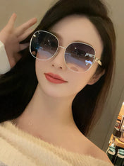 SIGNATURE ROUND SUNGLASSES L8638 IN METAL