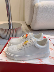 VIV' SKATE SNEAKERS IN WHITE CALFSKIN WITH CARTOON CHARM LACES