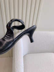 BALENCIAGA 25S HIGH SLINGBACK 35 MM IN BLACK LAMBSKIN WITH GOLD HARDWARE