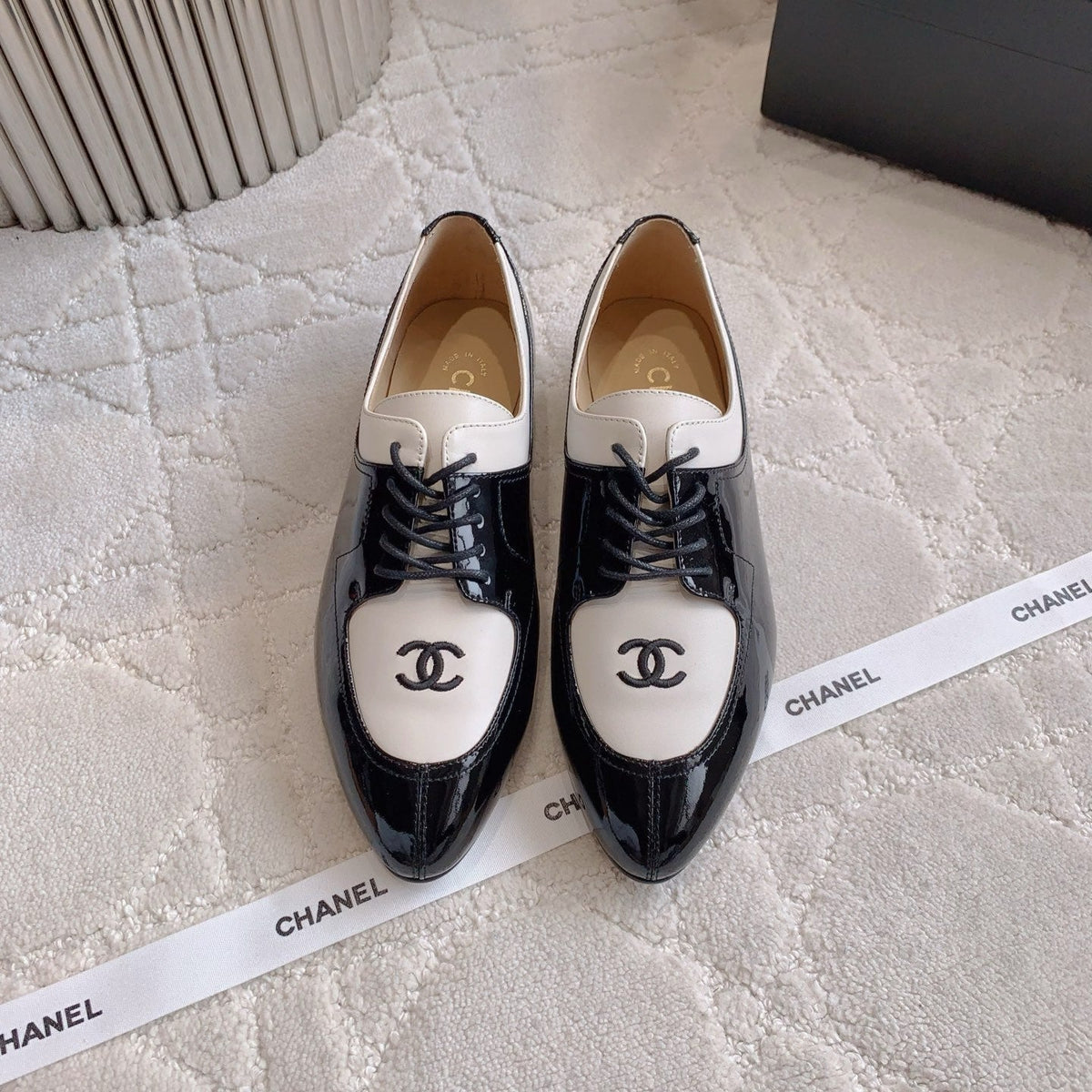 CHANEL 25S TWO TONE LACE UP IN BLACK AND WHITE SHINY CALFSKIN