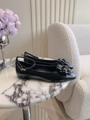 CHANEL 25S CAMELLIA SQUARE TOE FLATS IN BLACK CALFSKIN GOLD HARDWARE